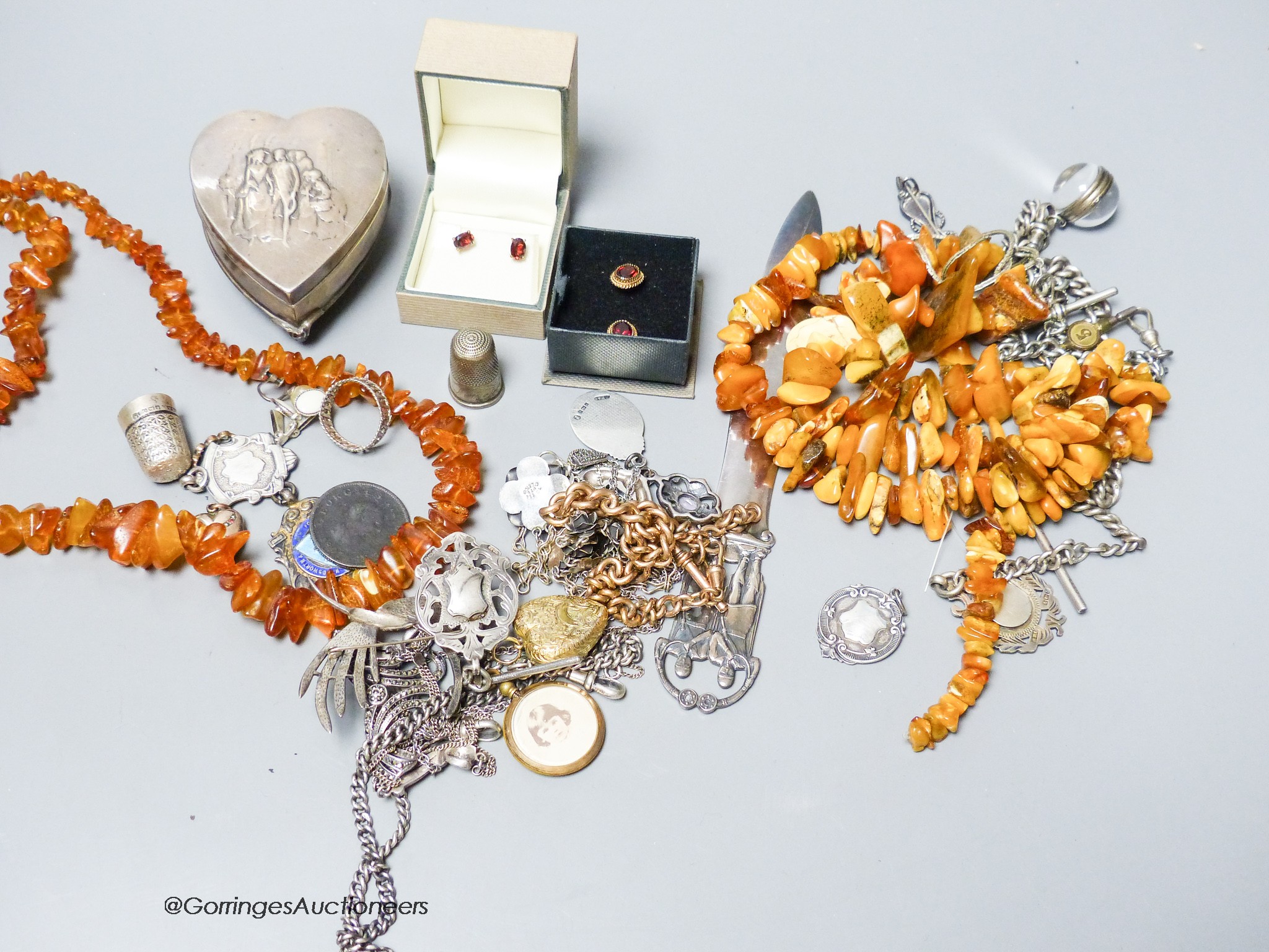 Mixed jewellery etc. including amber necklaces, silver trinket box and other items.